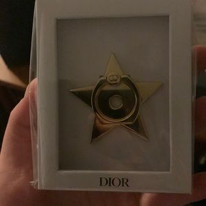 I am selling a Dior Smart Phone Ring. Never used, still in original packaging.